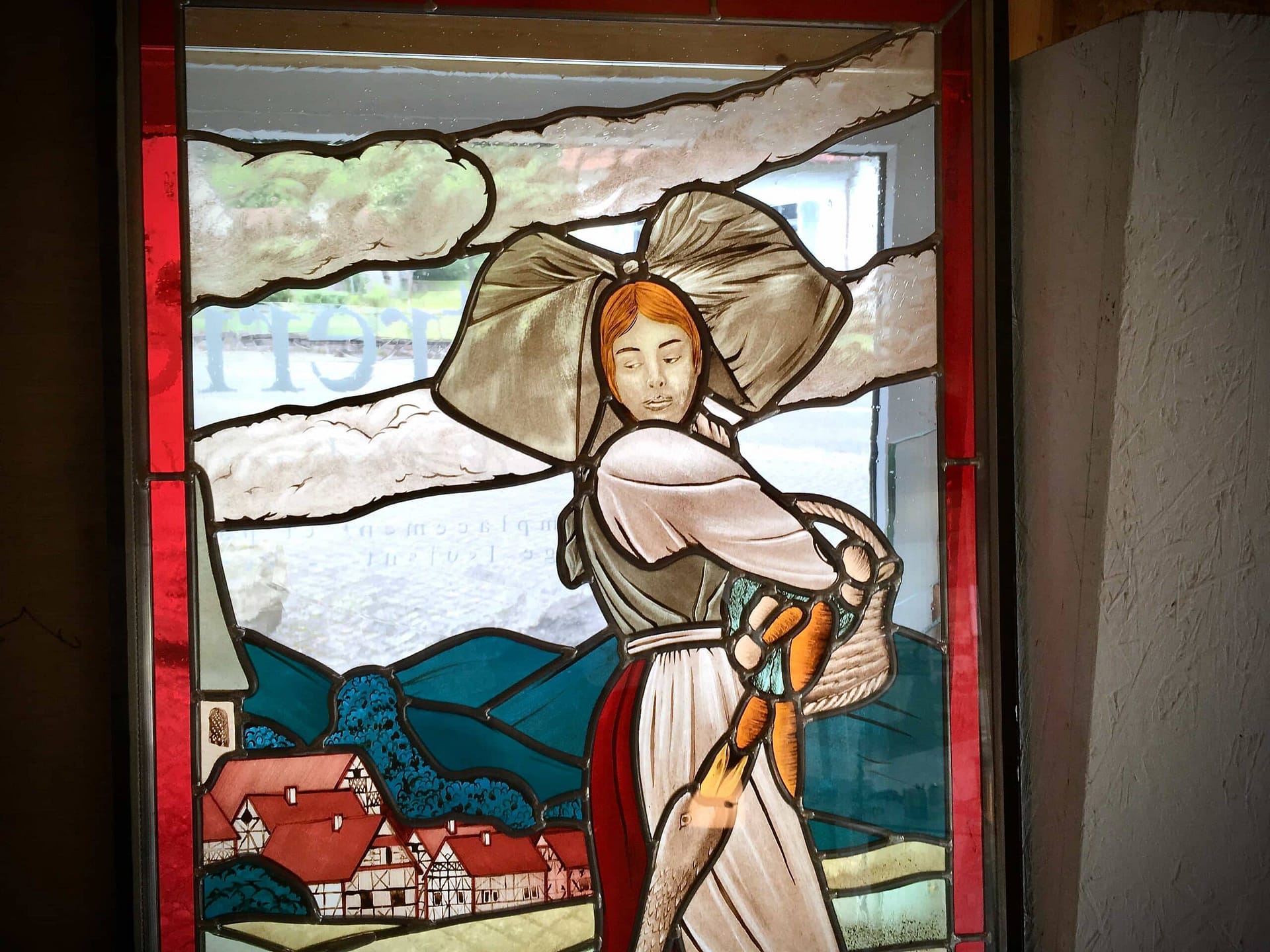La jeune fille, la coiffe et le paysage